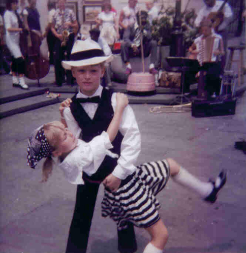 Boy dancer dipping his female partner