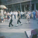 Kids performing a dance routine outside