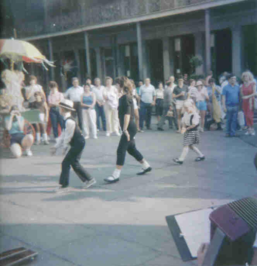 Kids performing a dance routine outside