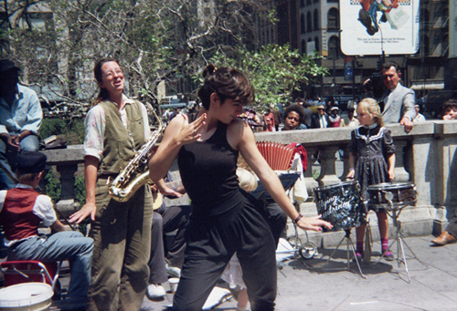 Girl dances outside of the New York Public Library