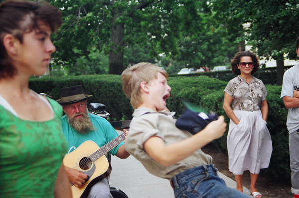 Kids doing a musical performance outside