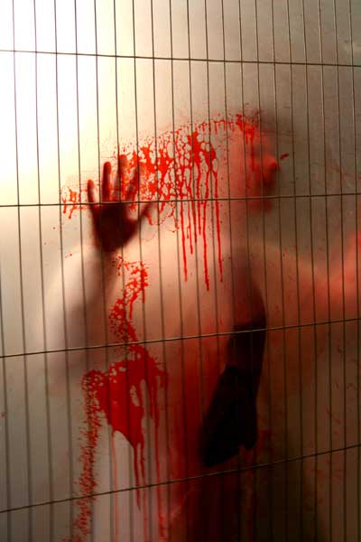 Man wearing a lab coat is brutally murdered
