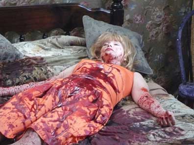 Actress Lynn Lowry covered in blood