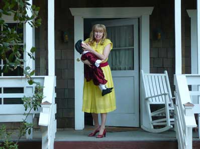 Actress Lynn Lowry carries a disturbing doll in Basement Jack