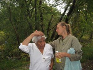 Director Rebecca Conroy preps Kumar Pallana for a scene.