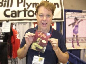 Bill Plympton holds up a copy of his DVD Dog Days