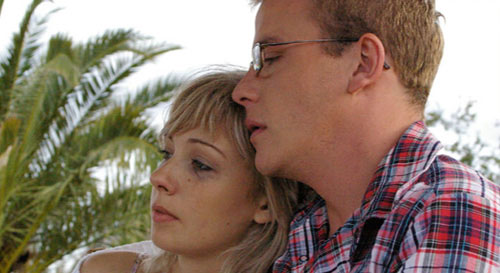 Kristen Condon and Ross Ditcham share an intimate moment