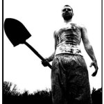 An amnesia victim covered in blood holds a shovel