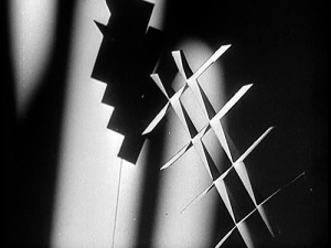An abstract shape casting a shadow