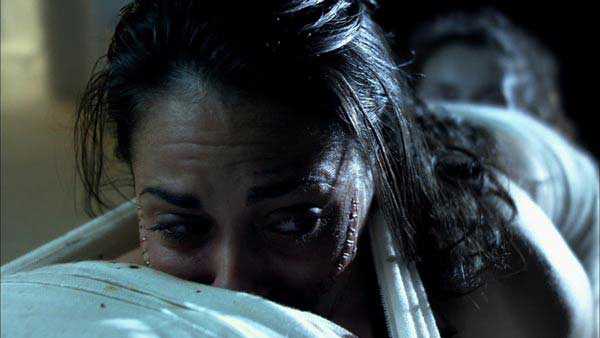 Close up of woman sewn to another person