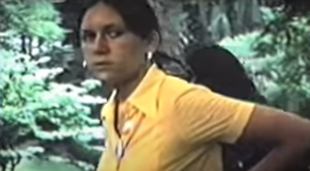 A teenage Marina Lutz wearing a yellow shirt