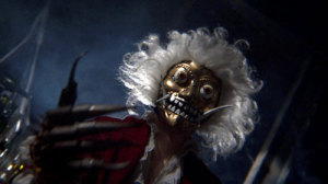 Crazy gold mask with fangs and fright wig