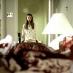 Young girl in pajamas looks over her mother's bloody corpse