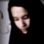 Young Muslim woman wears a black hajib