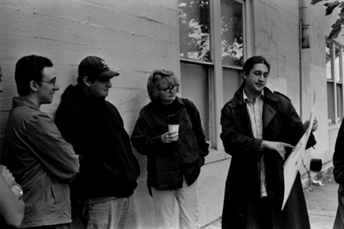 Director Waylon Bacon gives instructions to film extras