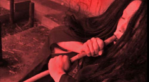 The feminine entity sucks poison from the Bardo