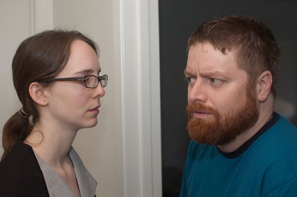 Cleaning woman and bearded man