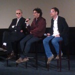 T-Bone Burnett, Joel Coen and Ethan Coen sit in directors chairs