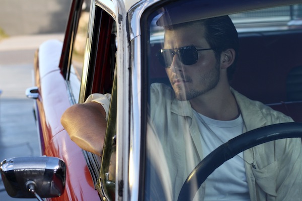 Actor Liam Graham as Max Woods sitting in a car