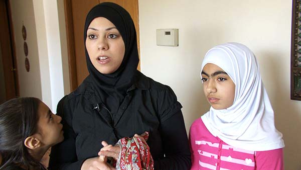 Amal Abusumayah and her daughter wear their hijab