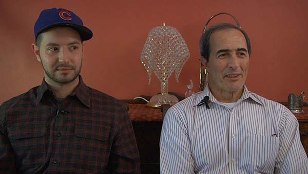 Musician Marwan Kamel sits with his father
