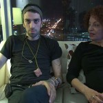 Wisam Alshaibi sits with his mother, Maha