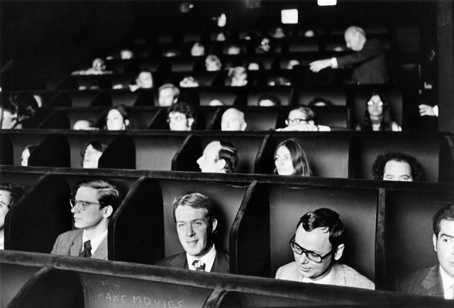 Audience watches a movie at the original Invisible Cinema theater of the Anthology Film Archives