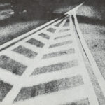 Film still of a road from Highway by Hilary Harris