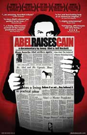 Abel Raises Cain Professional prankster Alan Abel reads a newspaper