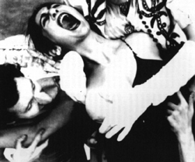 Flaming Creatures Film still from Jack Smith's Flaming Creatures in which a woman is attacked by men