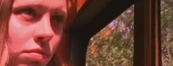 Close-up of a woman at an amusement park from Damon Packard's Reflections of Evil