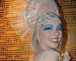 The Beautiful and Damned A pretty woman with extreme blue eye shadow and a tiara