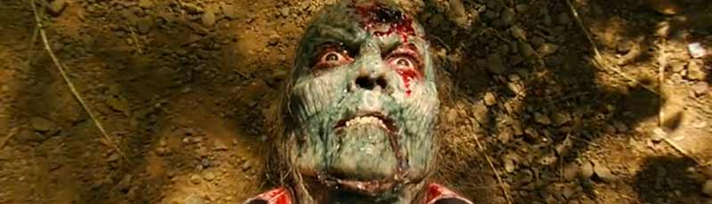 Green zombie with a giant hole in its skull