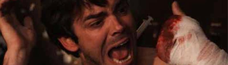 Man screams after his fingers have been cut off
