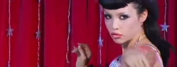 Pretty woman dances on stage