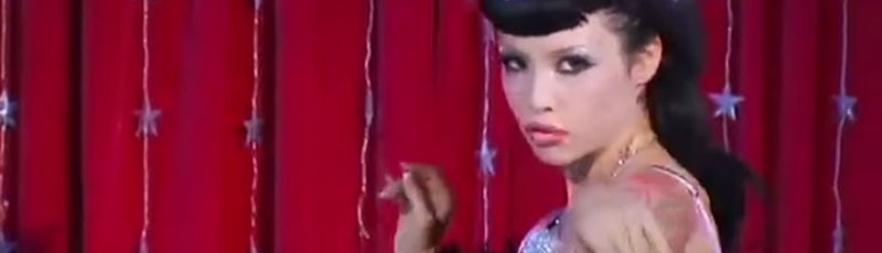 Pretty woman dances on stage