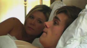Hooka Face and the Virgin Boy Teenage boy lies in bed with a prostitute
