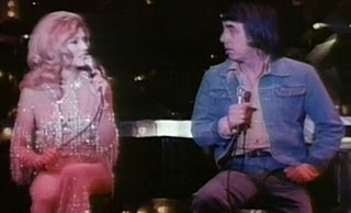 Nancy Sinatra and Lee Hazelwood on stage in Las Vegas