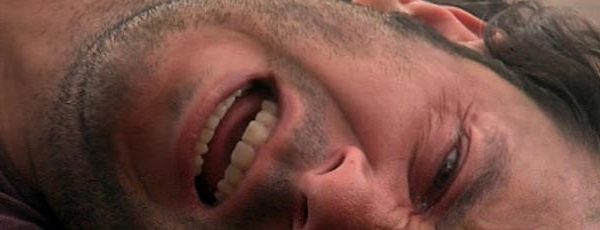 Man lies on the ground screaming