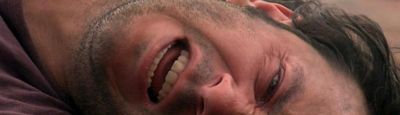 Man lies on the ground screaming