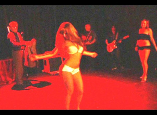 A go-go dancer performs on stage