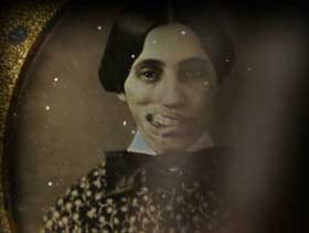 Through the Weeping Glass Old photograph of a woman with a disfigured face