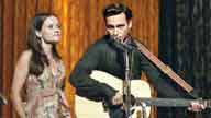 Joaquin Phoenix as Johnny Cash and Reese Witherspoon as June Carter Cash