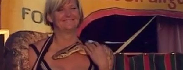 Lady snake charmer with her snake
