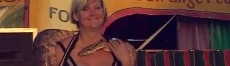 Lady snake charmer with her snake