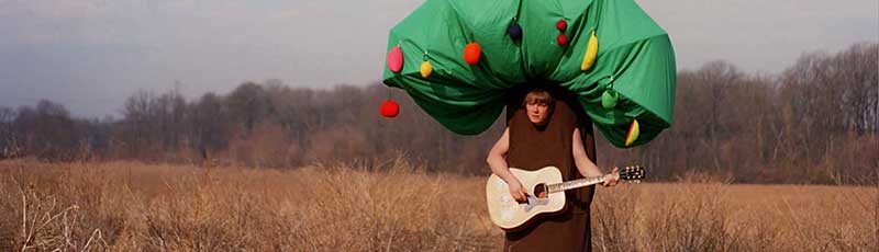 Daniel Smith of The Danielson Familie band dressed as a giant tree