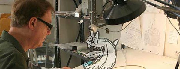 Animator Bill Plympton at his drawing board