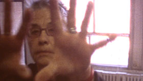 Barbara Hammer shows the palms of her hands