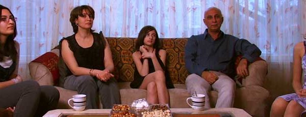 Muslim family in their living room