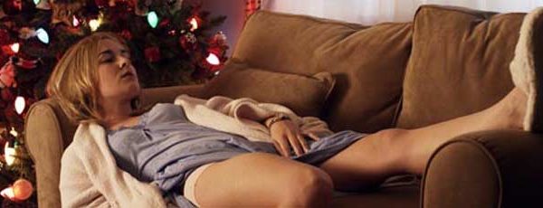 Woman lies passed out on the couch on Christmas Day
